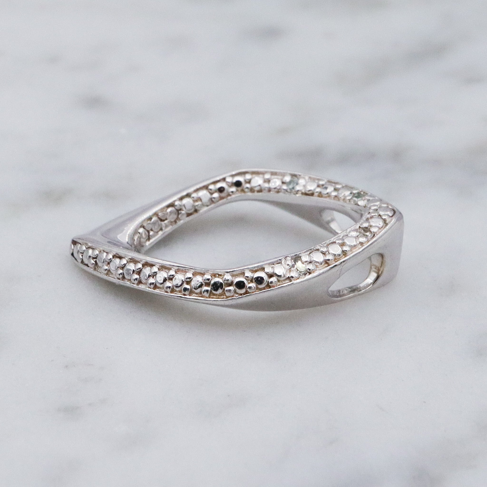 Vintage sterling silver and diamond abstract pendant